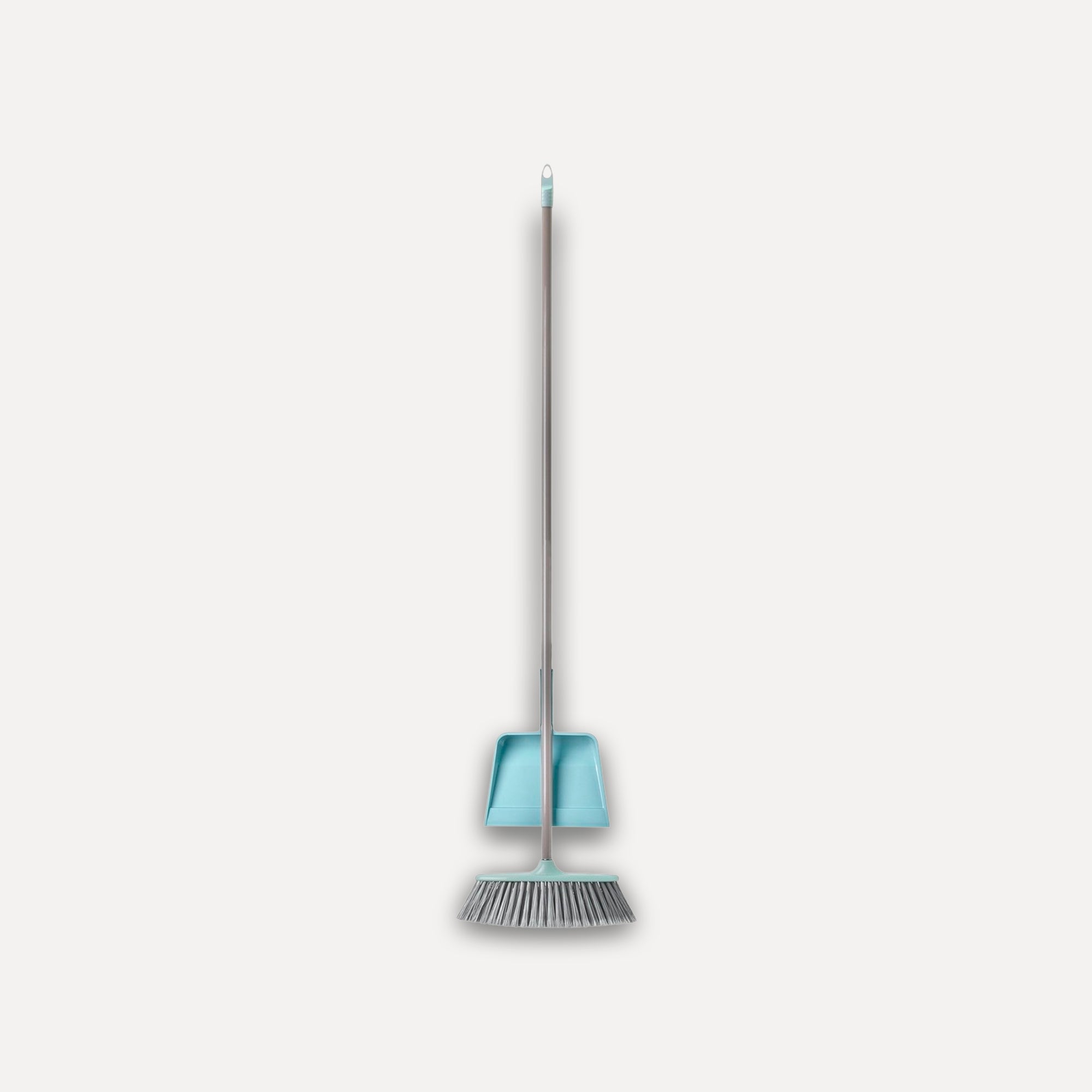 Broom and dustpan set with clip-on attachment