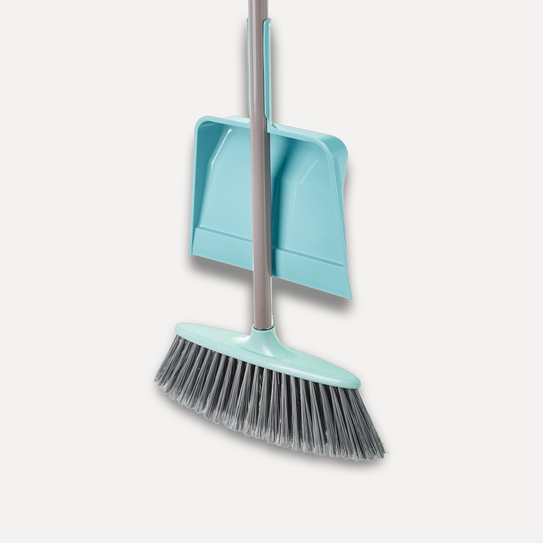 Broom and dustpan set with clip-on attachment