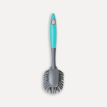 Oval dishwashing brush