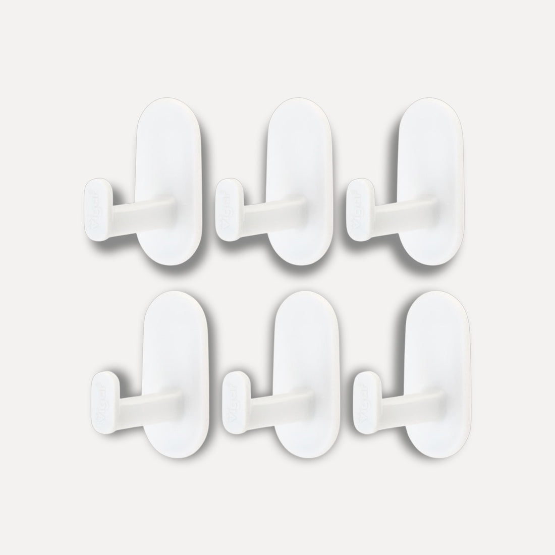 Pack of 6 small plastic hooks with adhesive