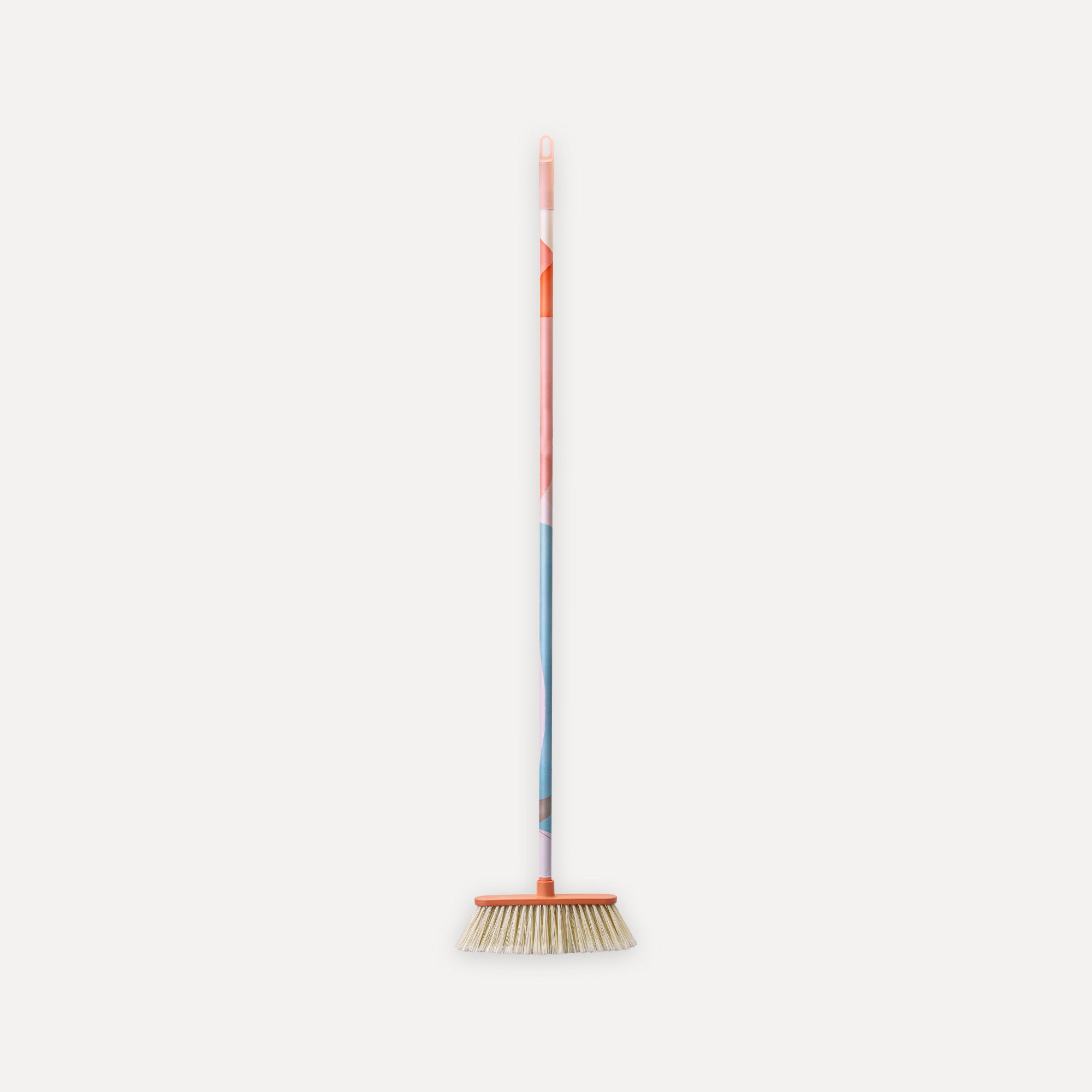 Decorated broom with stick