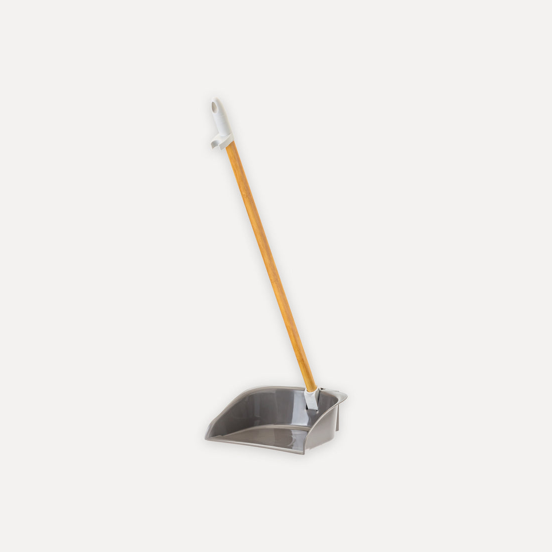 Collapsible stick anti-tip dustpan